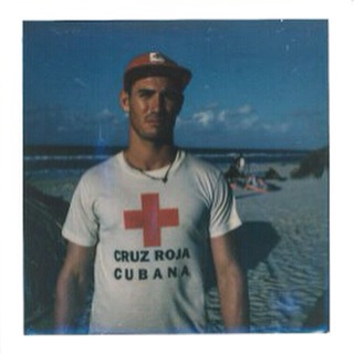This is Leandro, our #lifeguard at the #Varadero #Cuba #publicbeach. A guy who also sold us many #mojitos and #beers. #taketwoleaveone #ilive4travel