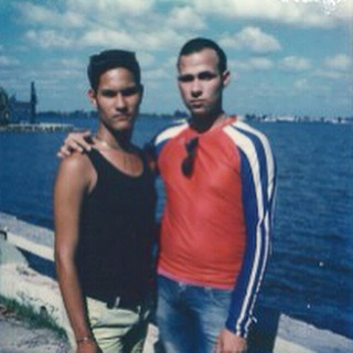 These are Ariel's friends, Dairon and Jaiden (sp?), at the #Cienfuegos #Cuba #Malecon. They wanted their #taketwoleaveone @impossible_hq pic together. Not sure if they're a couple or just friends... #ilive4travel