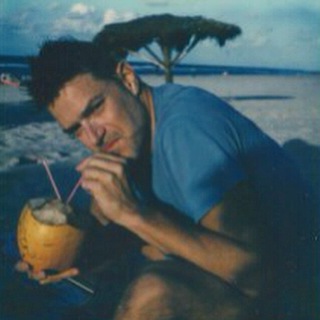 Here's my #adorbs #husband @eddiemgbol drinking some fresh #coco at the #Varadero #beach which our sweet and hot lifeguard Leandro just gave us at the end of the day. Hey, that other straw is mine! And I didn't #taketwoleaveone #polaroid. This one is all for me. #Cuba #ilive4travel