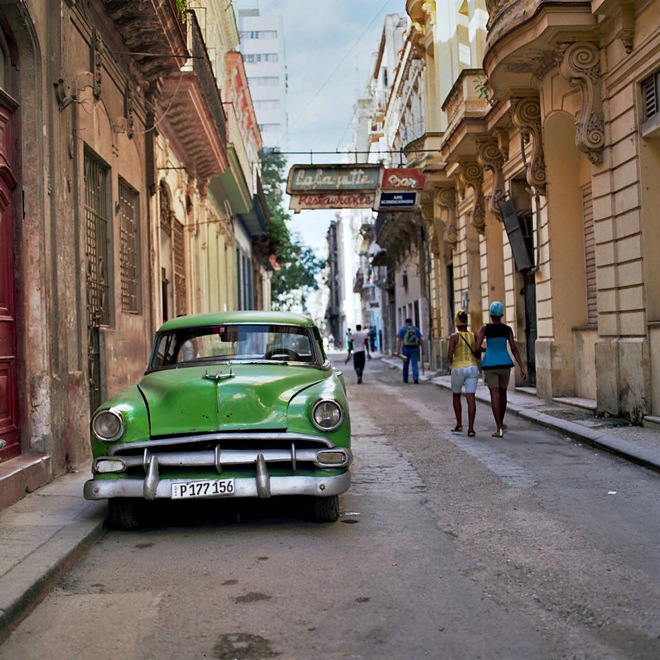 On this frigid #NYC day here's a warm pic of #oldhavana #havana #habanavieja in November. It looks like a movie set but @eddiemgbol and I just stumbled upon it waking down O'Reilly Street. #classiccar #pretty #city. #hasselblad #film #120 #120film #kodakportra